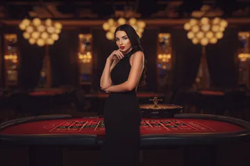 A laptop glowing with a bright login prompt in a minimalistic setup, symbolizing the protected access system at 2J777.